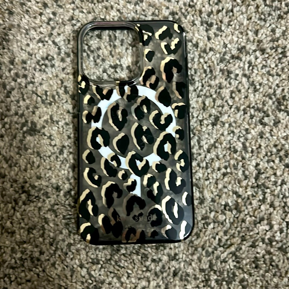 Kate Spade iPhone phone case perfect condition has a apple magnetic strip on it
